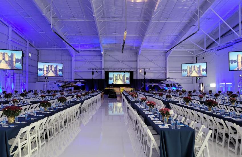 Dinner meeting for 1,400 Guests Flown Screens, Lighting & Sound