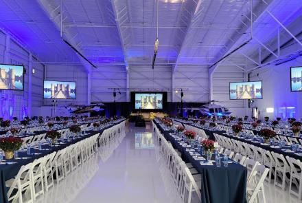 Dinner meeting for 1,400 Guests Flown Screens, Lighting & Sound